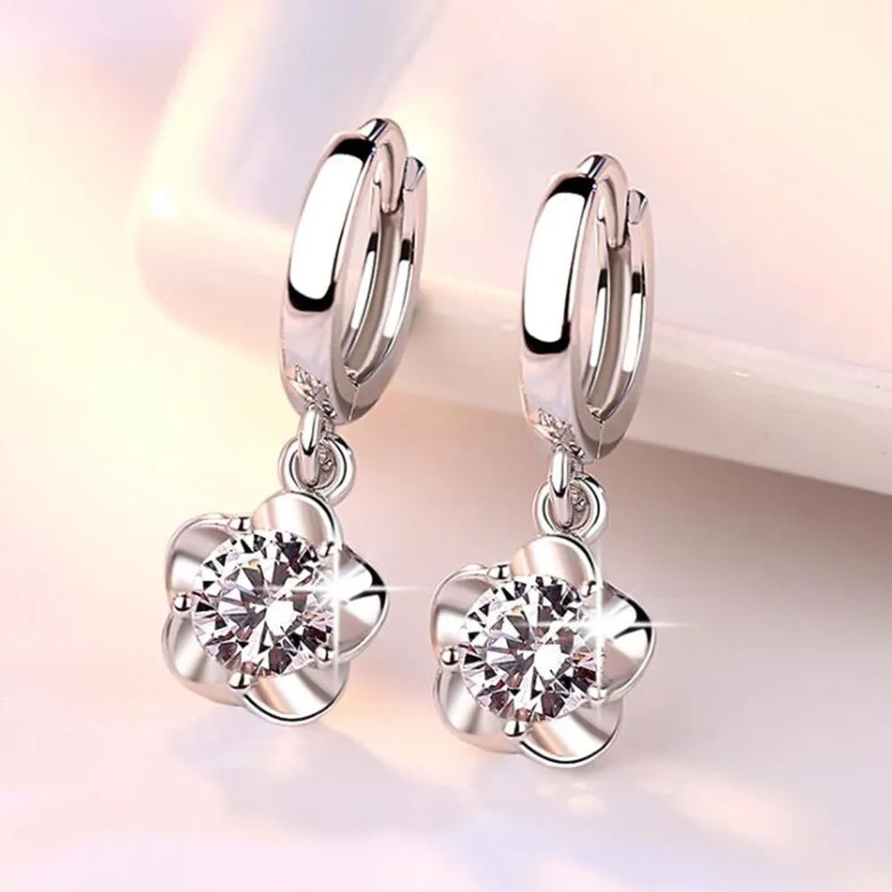 Sterling Silver Earrings Adorned with White and Purple Zircon