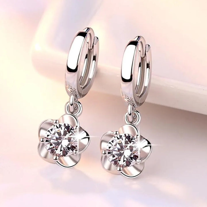 Sterling Silver Earrings Adorned with White and Purple Zircon